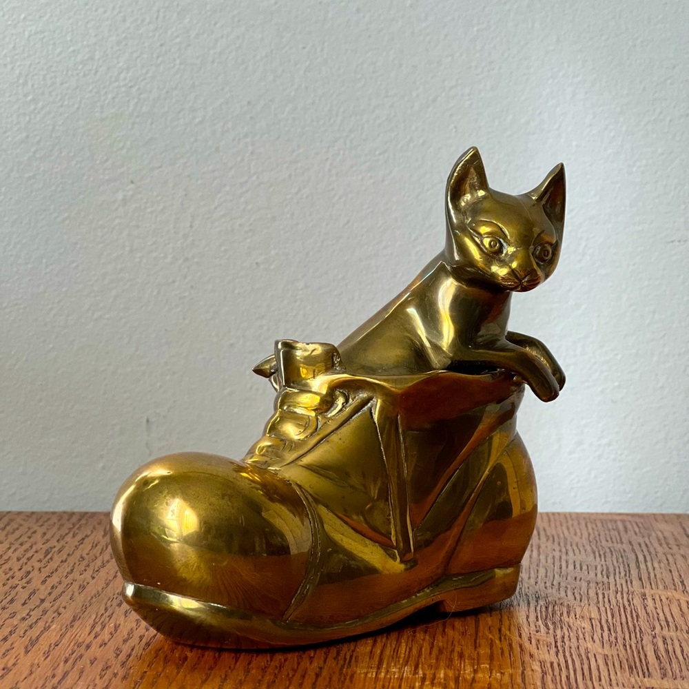 vintage brass cat in a brass boot